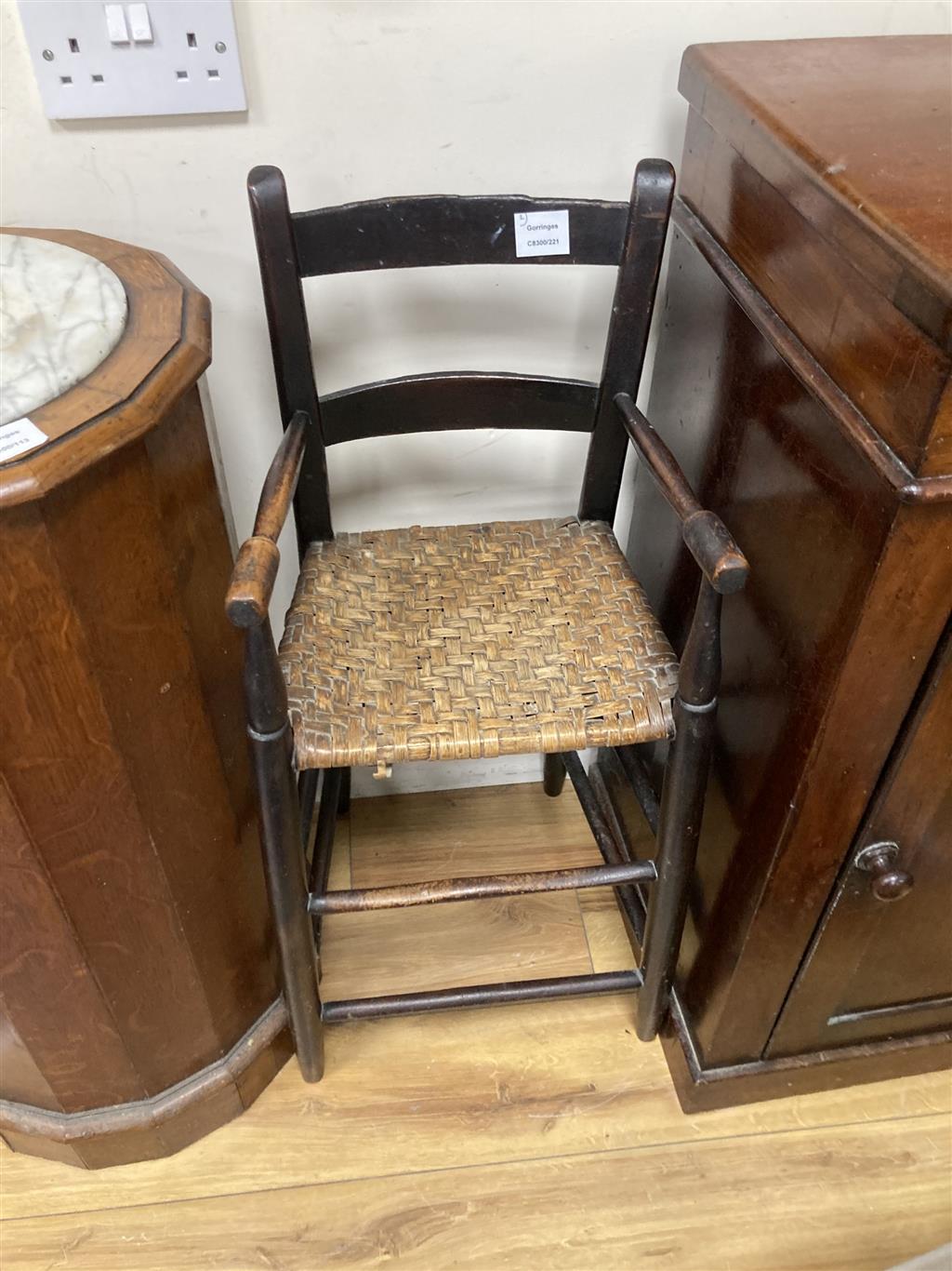 A Victorian mahogany pedestal cupboard, width 46cm depth 40cm height 87cm, together with a childs correction chair